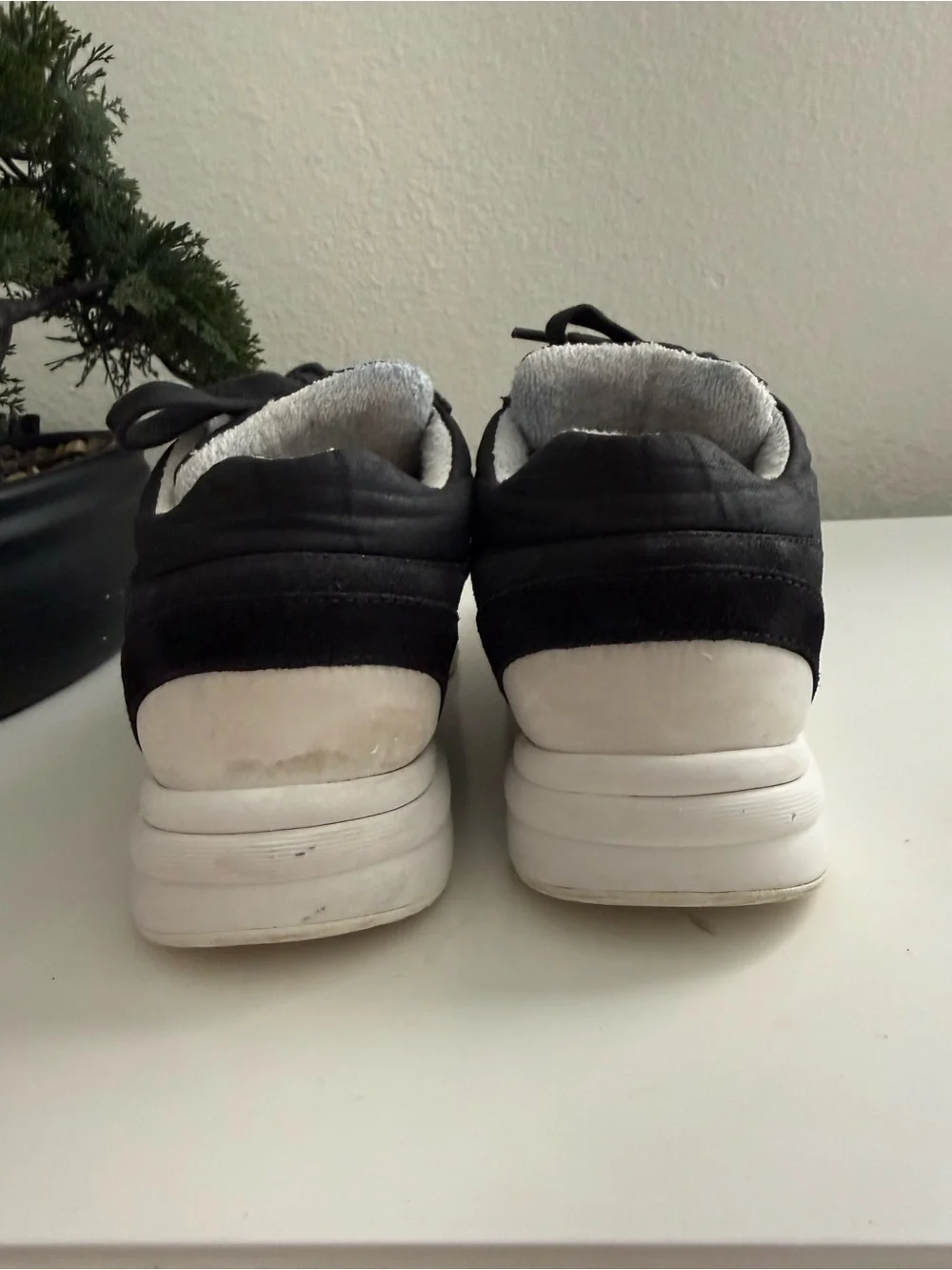 CHANEL Black and White Logo Sneakers